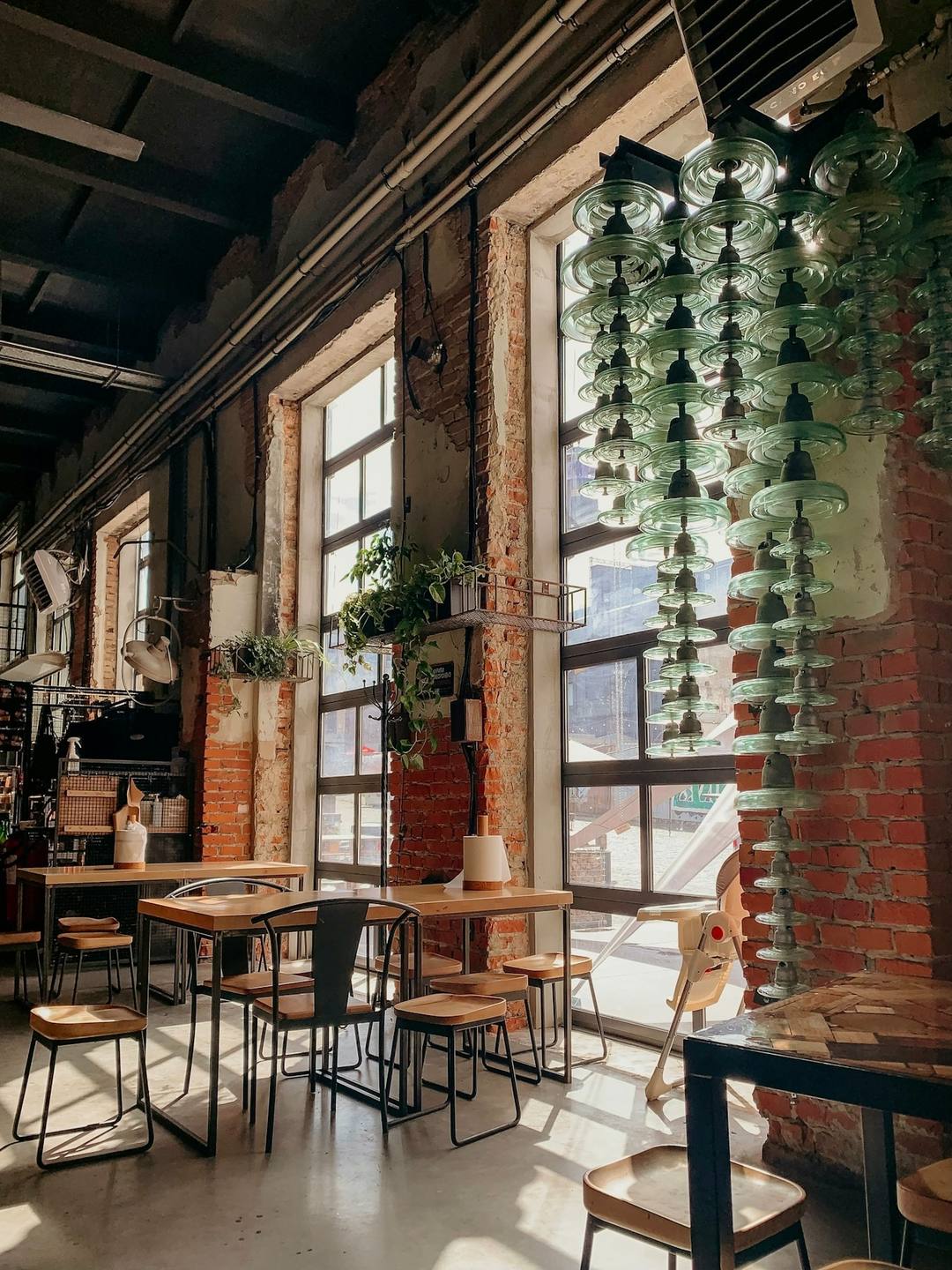 A café with wooden tables and chairs, unedited